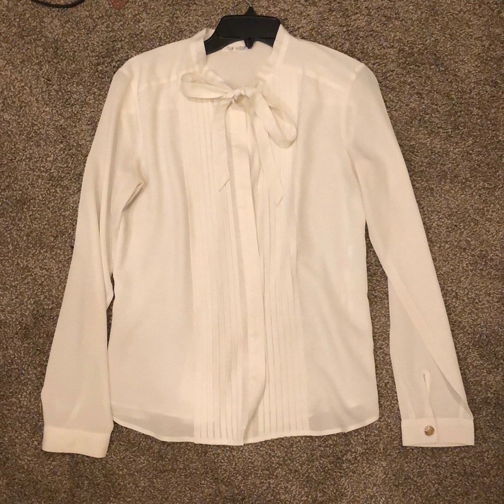 White Calvin Klein top with tie at neck